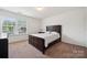 Bright bedroom with natural light from the window, providing a calm and peaceful ambiance at 3512 Gibbon Terrace Ct, Charlotte, NC 28269