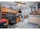 This bedroom is adorned with sports memorabilia, multiple computer monitors, and a ceiling fan at 3513 Briarcliff Acres Dr, Lincolnton, NC 28092