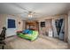 Spacious bonus bedroom with tile floors, closet, and exterior door to outside at 3513 Briarcliff Acres Dr, Lincolnton, NC 28092