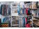 Walk-in closet with built-in shelving and hanging rods for ample storage at 3513 Briarcliff Acres Dr, Lincolnton, NC 28092