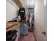 Walk-in closet with clothing racks, shelves, and carpeted floors at 3513 Briarcliff Acres Dr, Lincolnton, NC 28092