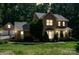 Charming brick two-story home with a covered porch and well-manicured lawn and landscape at 3513 Briarcliff Acres Dr, Lincolnton, NC 28092