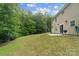 Spacious backyard with grassy area and patio, great for relaxing at 4002 Paddle Wheel Ln, Indian Trail, NC 28079