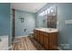 Well-appointed bathroom with a double vanity, large mirror, and a walk-in shower, ideal for a growing Gathering at 4002 Paddle Wheel Ln, Indian Trail, NC 28079