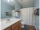 Charming bathroom with vanity, mirror, and shower with curtain at 4002 Paddle Wheel Ln, Indian Trail, NC 28079