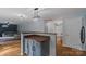 Kitchen boasts modern pendant lighting, custom cabinets, and bar-top for entertaining at 4002 Paddle Wheel Ln, Indian Trail, NC 28079