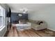 Bright living room with a decorative fireplace, plush sectional sofa, and modern decor at 4002 Paddle Wheel Ln, Indian Trail, NC 28079