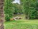 Scenic view of a private dock on the lake, surrounded by lush greenery and a tranquil atmosphere at 4290 Barbrick St, Sherrills Ford, NC 28673