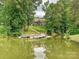 Picturesque lakefront property with a private dock and beautiful home nestled among the trees at 4290 Barbrick St, Sherrills Ford, NC 28673