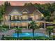 Stunning lakefront home boasts multiple patios, a swimming pool, and a beautifully landscaped backyard at 4290 Barbrick St, Sherrills Ford, NC 28673