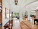 Grand foyer with high ceilings, arched doorways, hardwood floors, and views of the living spaces at 4290 Barbrick St, Sherrills Ford, NC 28673