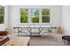 Bright game room with a ping pong table and natural light streaming through large windows at 435 Galbreath Ct # 128, Fort Mill, SC 29708