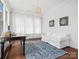 Comfortable home office with hardwood floors, white walls and lots of natural light at 435 Galbreath Ct # 128, Fort Mill, SC 29708