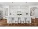 Gourmet kitchen featuring a large island, quartz countertops, and pendant lighting at 435 Galbreath Ct # 128, Fort Mill, SC 29708