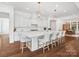 Bright kitchen with an expansive center island, updated appliances, and open floor plan at 435 Galbreath Ct # 128, Fort Mill, SC 29708