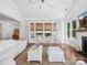 Living room with fireplace and open layout to dining and kitchen at 435 Galbreath Ct # 128, Fort Mill, SC 29708