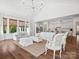 Open concept living room with vaulted ceilings and hardwood floors at 435 Galbreath Ct # 128, Fort Mill, SC 29708