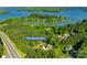 An aerial view of the property located at 546 Little Cove Lane with lake access and mature trees at 546 Little Cove Ln, Lake Wylie, SC 29710