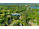 Aerial view of the neighborhood, featuring the property at 546 Little Cove Lane, surrounded by mature trees at 546 Little Cove Ln, Lake Wylie, SC 29710