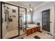 Beautiful bathroom features a frameless shower, soaking tub and decorative tile at 546 Little Cove Ln, Lake Wylie, SC 29710