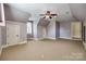 Angled ceiling bedroom with gray walls, carpet, ceiling fan, a dormer and one window at 546 Little Cove Ln, Lake Wylie, SC 29710