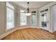 Sunny breakfast nook with lots of windows and hardwood floors at 546 Little Cove Ln, Lake Wylie, SC 29710