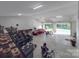 Spacious garage featuring multiple vehicles, tool storage, and ample room for various projects at 574 Crescent Rd, Rockwell, NC 28138