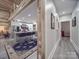 Hallway connecting the kitchen and hallway with hardwood features at 574 Crescent Rd, Rockwell, NC 28138
