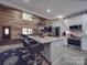 Kitchen island with seating near modern stainless steel appliances at 574 Crescent Rd, Rockwell, NC 28138
