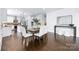 Dining room with views into the kitchen and living room at 6206 Glencairn Ct, Charlotte, NC 28269