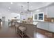 Kitchen and dining area with large island, pendant lights and stainless appliances at 6206 Glencairn Ct, Charlotte, NC 28269