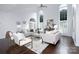 Bright living room with vaulted ceilings and views of the front yard at 6206 Glencairn Ct, Charlotte, NC 28269