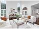 Bright and airy living room with vaulted ceilings and many windows at 6206 Glencairn Ct, Charlotte, NC 28269