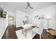 Bright home office with white walls, hardwood floors, and a modern desk at 6206 Glencairn Ct, Charlotte, NC 28269