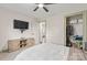 Cozy bedroom with TV, mounted storage cabinet and closet space at 632 Skyland N Dr, Mount Pleasant, NC 28124