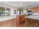 Bright kitchen with stainless steel appliances, granite countertops, and a center island at 632 Skyland N Dr, Mount Pleasant, NC 28124