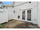 Backyard features a door and sliding glass doors, creating an inviting outdoor space at 6443 Mallard View Ln, Charlotte, NC 28269