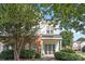 Charming two-story home featuring brick accents and lush landscaping in a well-maintained community at 6443 Mallard View Ln, Charlotte, NC 28269