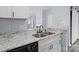 Stylish kitchen with granite countertops, stainless steel appliances, and an open view to the living area at 6443 Mallard View Ln, Charlotte, NC 28269