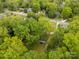 Lush canopy of trees hides beautiful homes in a lovely neighborhood in this picturesque aerial view at 7 Kings Mountain St, York, SC 29745