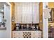 Butler's pantry with cabinets, wine rack, and countertop space at 7 Kings Mountain St, York, SC 29745