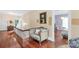 Cozy hallway with hardwood floors, vintage furniture, and easy access to bedrooms at 7 Kings Mountain St, York, SC 29745