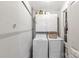 Functional laundry room with washer, dryer, and storage cabinets at 7 Kings Mountain St, York, SC 29745