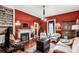 Elegant living room features hardwood floors, ornate fireplace, and cozy seating arrangement at 7 Kings Mountain St, York, SC 29745