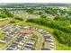 A beautiful aerial view showcases a vibrant community with lush landscaping and modern homes at 700 Windage Way, Pineville, NC 28134