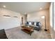 Inviting living room with a cozy sofa, stylish coffee table, and serene ambiance, perfect for relaxation and entertainment at 700 Windage Way, Pineville, NC 28134