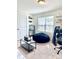 Bedroom featuring a beanbag chair, a desk, and neutral walls with a window allowing ample natural light at 7024 Wheyfield Dr, Charlotte, NC 28215