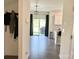 A kitchen with a view to the living room and backyard at 7024 Wheyfield Dr, Charlotte, NC 28215