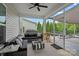 Relaxing screened porch with comfortable seating and outdoor views at 7331 Millstone Sw Cir, Concord, NC 28025