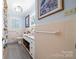 Bathroom featuring a double sink vanity and ample storage space at 800 Davenport St, Monroe, NC 28112